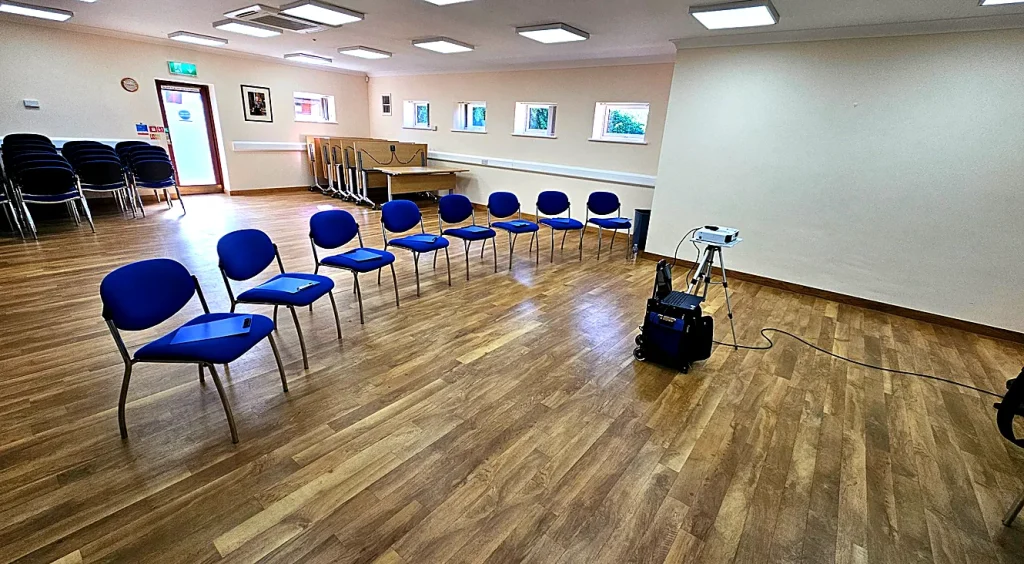 First aid training Stowmarket – professional training venue with seating and projector equipment set up for on-site course